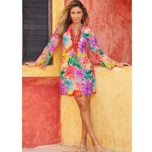 Multi-color and embellished long sleeved dress.